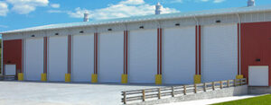 multiple commercial garage doors next to each other in an industrial setting